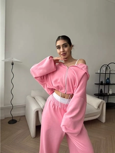 Detail of pink cotton-blend tracksuit with cropped zip hoodie and wide-leg joggers