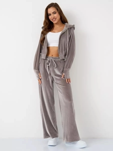 Detailed full-body view of grey velvet hoodie and high-waist wide-leg pants two-piece set