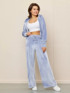 Detailed view of light blue velvet three-piece set with zip hoodie and wide-leg pants