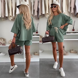 Front and back view of casual sage green oversized T-shirt and drawstring shorts set