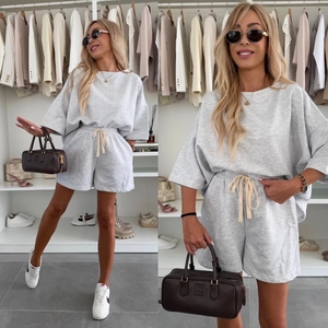 Women's casual light gray two-piece set with short sleeve t-shirt and drawstring shorts