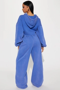 Detail view of royal blue hooded sweatshirt and wide-leg jogger set back profile