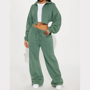 Sage green two-piece tracksuit featuring cropped zip-up hoodie and high-waist wide-leg pants