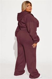 Deep burgundy two-piece tracksuit featuring a cropped hoodie and wide-leg jogger pants
