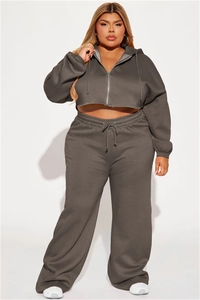 Detail of plus size cropped hoodie and high waist wide leg sweatpants in dark grey