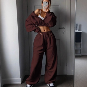 Women's two-piece tracksuit set with cropped zip hoodie and high-waist wide-leg pants