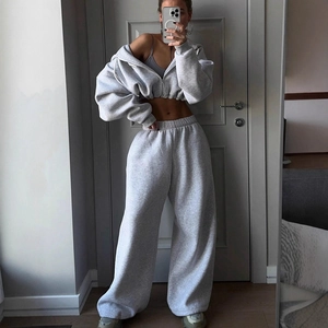 Women's dark grey hooded tracksuit featuring a cropped zipper jacket and wide-leg joggers