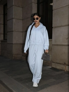 Light blue two-piece cotton tracksuit featuring zip-up hoodie and wide-leg sweatpants