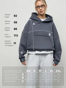 Size chart for cropped hoodie including length and sleeve measurements with model data