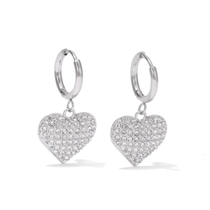 Elegant gold heart earrings with sparkling cubic zirconia on a clean white background