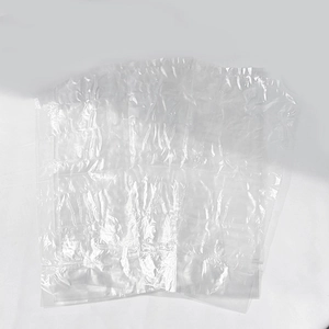 Stack of 24-cell self-sealing disposable ice cube bags made of clear PE plastic material