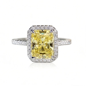 Luxurious S925 sterling silver radiant cut yellow diamond ring with a halo of white stones