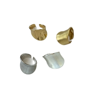 Minimalist wide wave open rings in polished and brushed gold and silver finishes