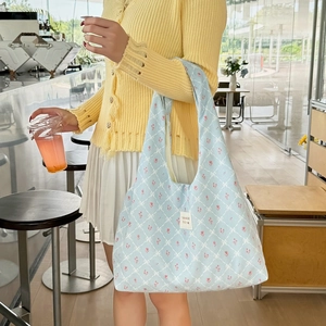 Floral print canvas tote bag in light blue with pink flowers for daily casual use