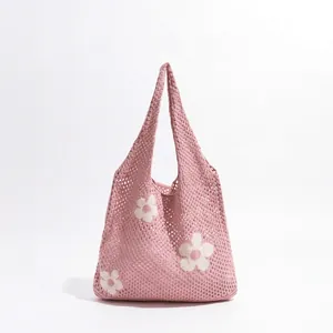 Sakura pink knitted crochet tote bag with white flower patterns for summer shopping