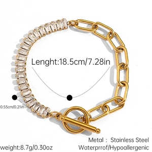 Detail of 18k gold plated steel chain bracelet with rectangle zircons and toggle clasp