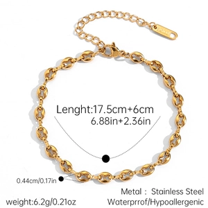 Detail of 18k gold plated stainless steel link bracelet with lobster clasp and tag