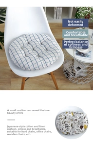 Detail of round cotton linen chair cushions with breathable plaid and floral patterns