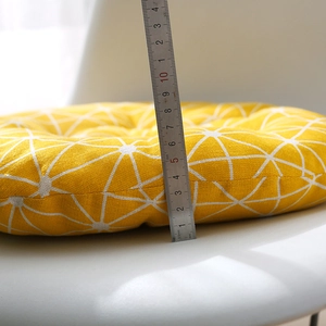 Thick 8.5cm round yellow seat cushion with geometric star pattern for office and dining chairs