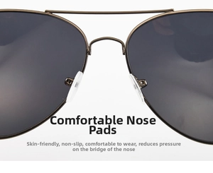 Detail of comfortable silicone nose pads on classic bronze metal pilot sunglasses