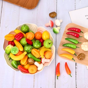 Realistic mini artificial foam vegetable and fruit set displayed on a wooden surface