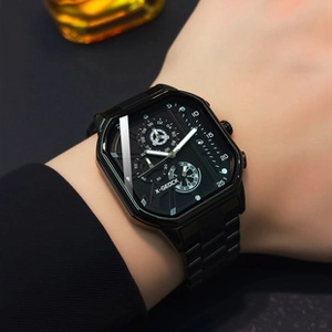 Close-up of black square quartz watch with multi-functional dials on male model wrist