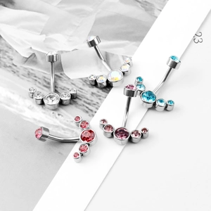 Detailed set of five stainless steel belly rings with fan-shaped zirconia in multiple colors