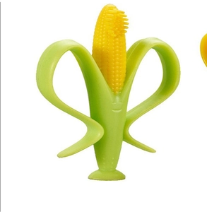 Detail view of corn-shaped baby teether with silicone bristles and suction base