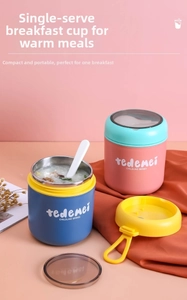 Detail of colorful stainless steel breakfast cups with portable handles and spoons