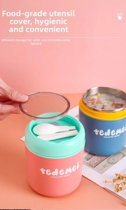 Detail of insulated food jar with transparent lid and storage compartment for spoon