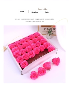 Glittery peach pink artificial roses in a gift box for DIY floral arrangements