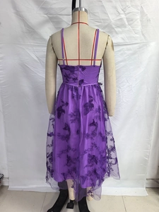 Detail of purple tulle dress showing butterfly embroidery and back zipper closure