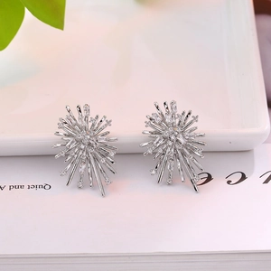 Sparkling silver sunburst stud earrings with brilliant zircon stones for a luxury look