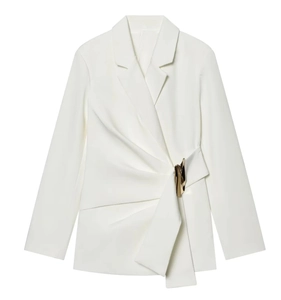 Detail of white blazer featuring asymmetric waist drapery and golden buckle closure