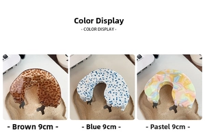 Three 9cm acetate hair claws in brown spotted, blue dotted, and light colorful textures