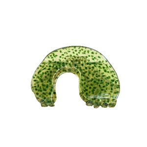 Elegant emerald green acetate hair claw clip with tortoiseshell pattern for updo hair styles