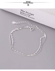 Detail of S925 sterling silver double layer bracelet with snake chain and lobster clasp