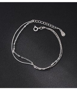 Detail of 925 sterling silver double layer snake chain bracelet with S925 engraved tag
