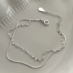 Double-layered 925 sterling silver snake chain bracelet with shiny faceted charms for women
