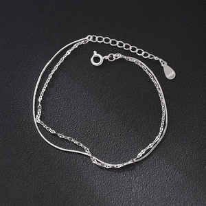 Double-layered 925 sterling silver snake chain bracelet with shiny faceted texture