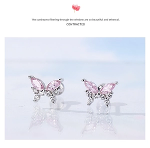 Detail view of pink zircon butterfly stud earrings with secure screw ball back closure
