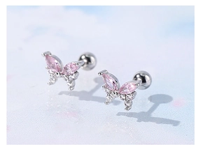 Macro view of butterfly earrings with pink marquise stones and silver screw backs