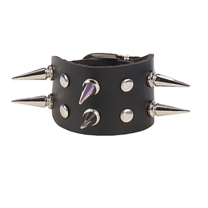 Punk leather bracelet with silver conical spikes and studs in retro gothic style