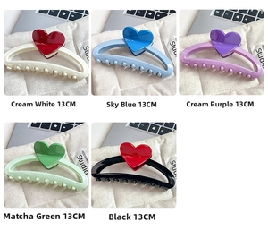 Set of five 13cm heart-patterned hair claw clips in assorted pastel and black colors
