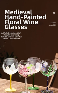 Detailed macro view of four hand-painted floral wine glasses with colorful glass stems