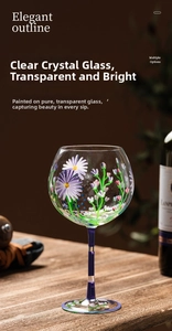 Detail of hand-painted floral motifs on a crystal wine glass with purple daisy patterns