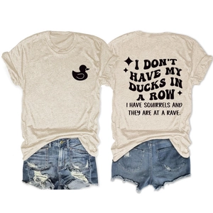 Close-up of duck logo print and funny text on oatmeal cotton crewneck t-shirt