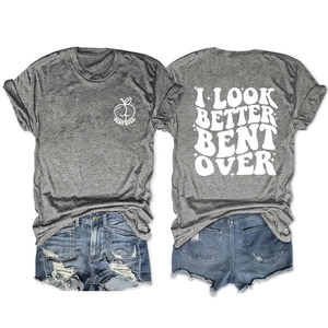 Flat lay of gray crew neck t-shirt with back text print and blue distressed denim shorts