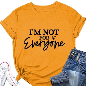 Flat lay of mustard cotton t-shirt with I'm Not For Everyone text and rolled sleeves