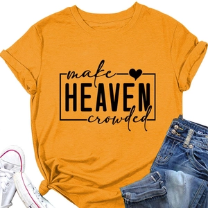 Detail of yellow slogan T-shirt with a knot hem, featuring black heart graphic print